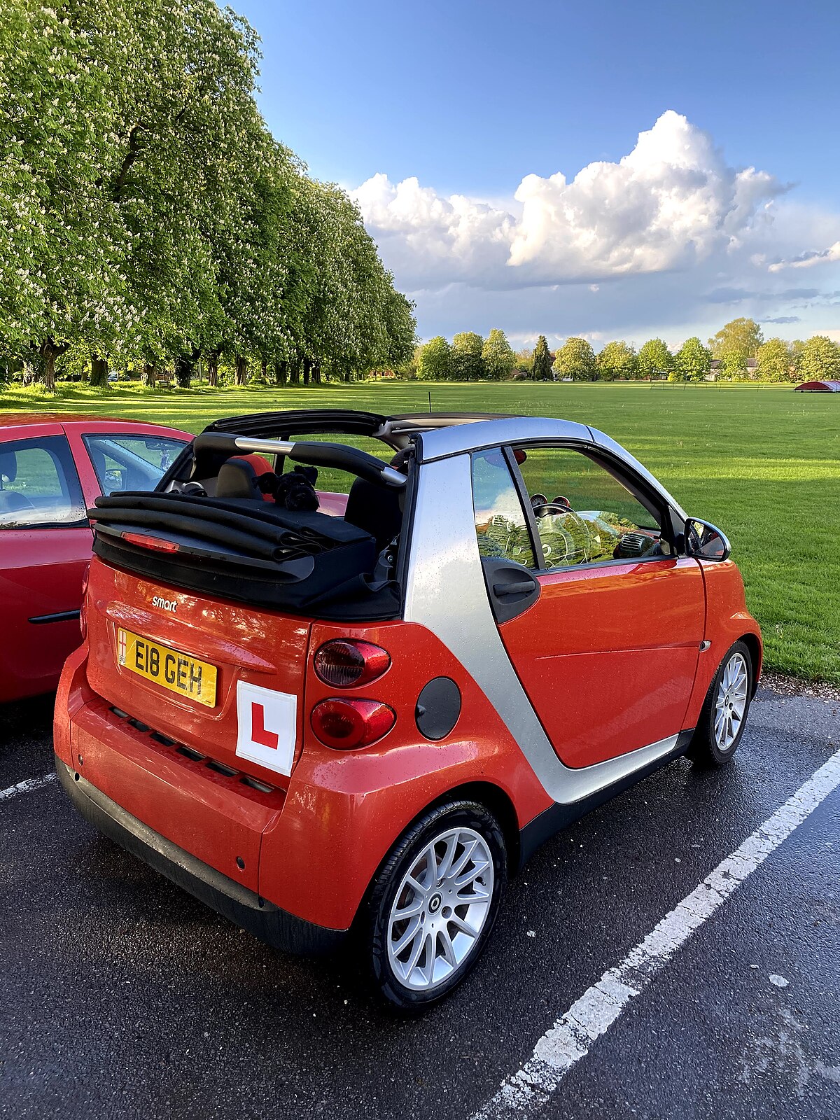 A learner car parked at a UK test centre, the kind of moment that bookends a first-time pass attempt